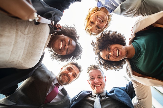 stock photo of professionals looking at camera from below