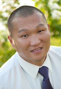 Headshot of Justin Ryan sitting outdoors