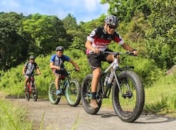 family biking outdoors