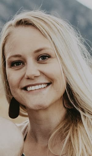 Therapist Kelsey Schwartz outdoors smiling