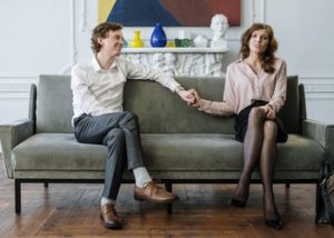 couple smiling during their therapy session