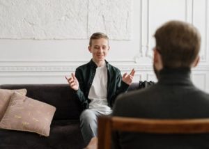 teenager at therapy session