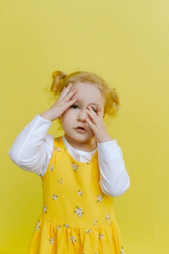 little girl with yellow dress