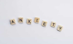 Wood blocks Spelling "ANXIETY"